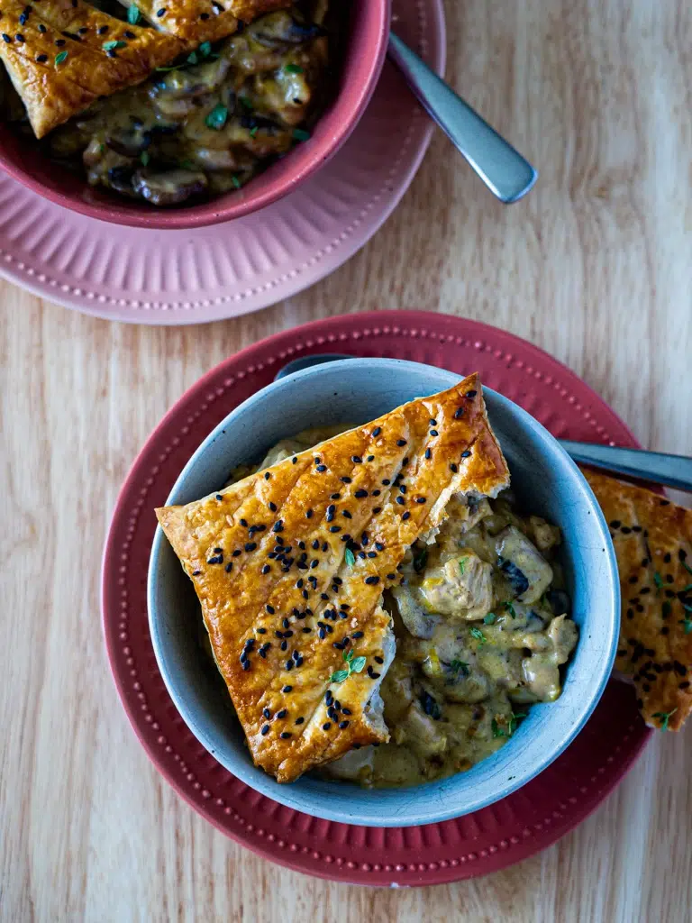 Top view of flaky, buttery pastry with a separate, perfectly baked filling, ensuring no soggy pie.