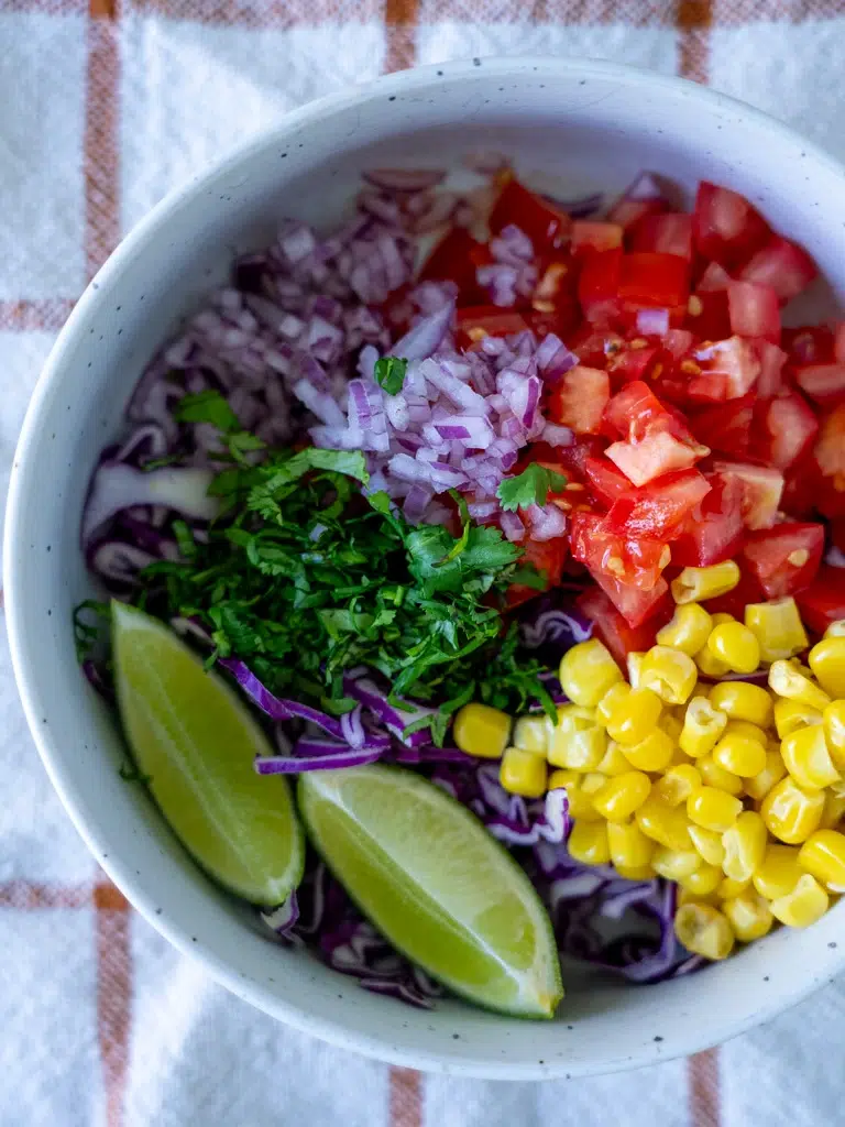 Ingredients for Peri Peri chicken arranged in a bowl, ready for cooking.