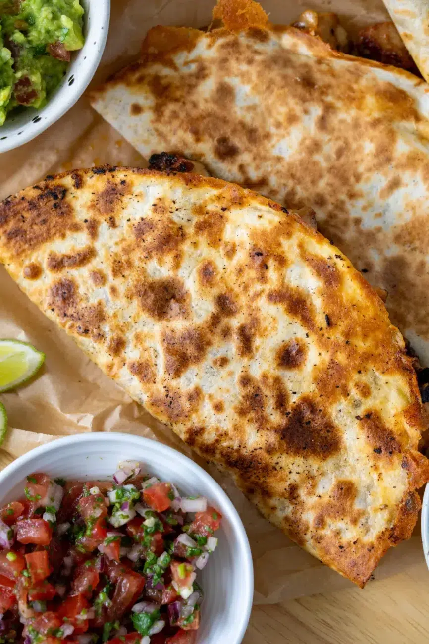 Close up of Chicken Quesadillas recipe including guacamole