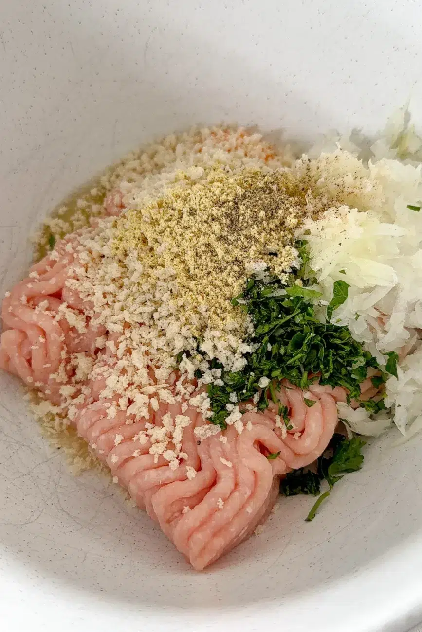 chicken rissole ingredients in a bowl ready to mix