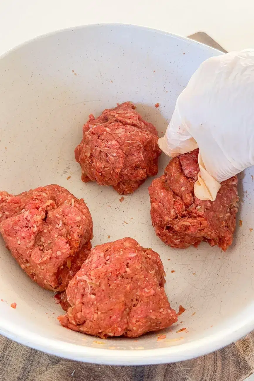 Beef mixture divided into quarters