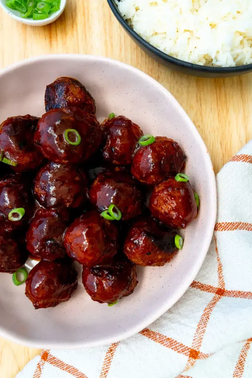 Finished meatball recipe with rice on side