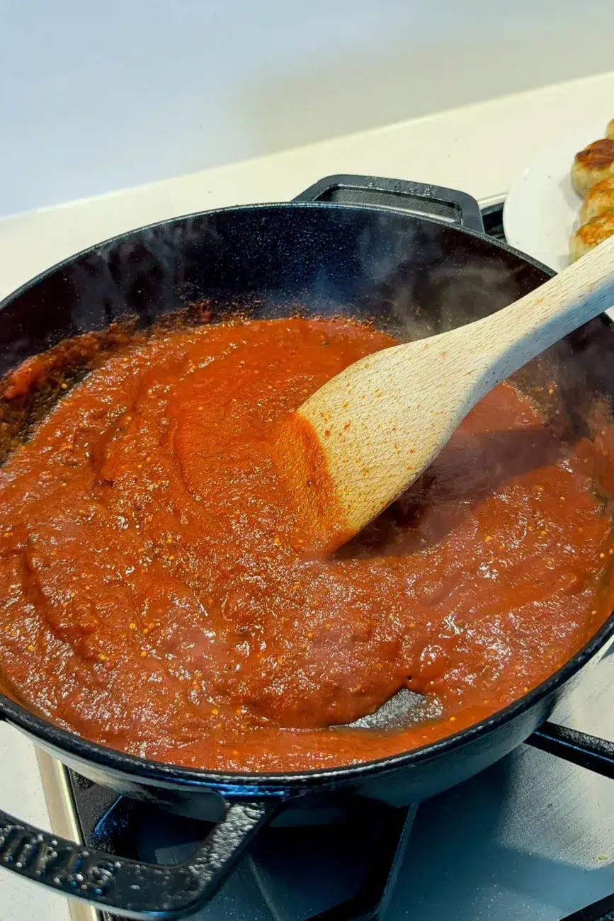 Adding Tomato Passata to Butter Chicken