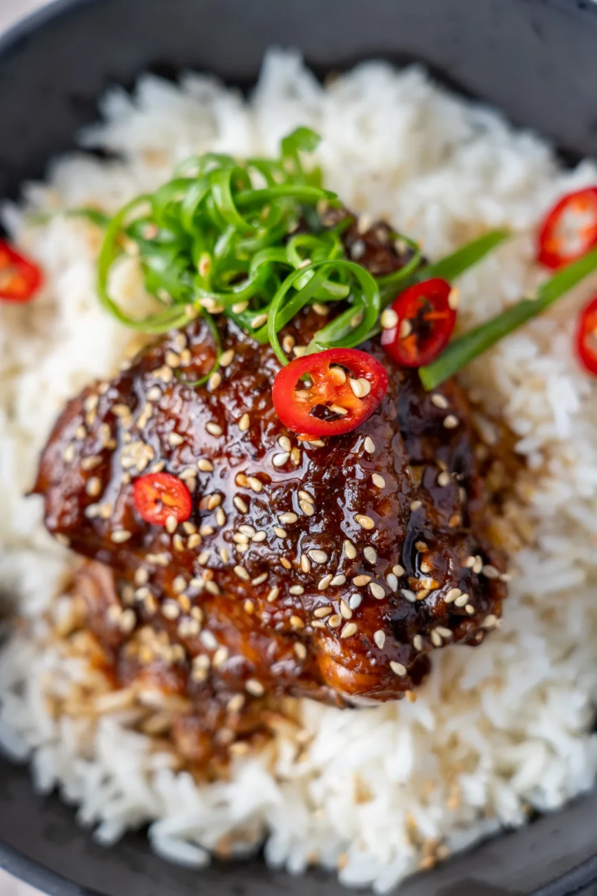 Braised soy chicken served over jasmine rice