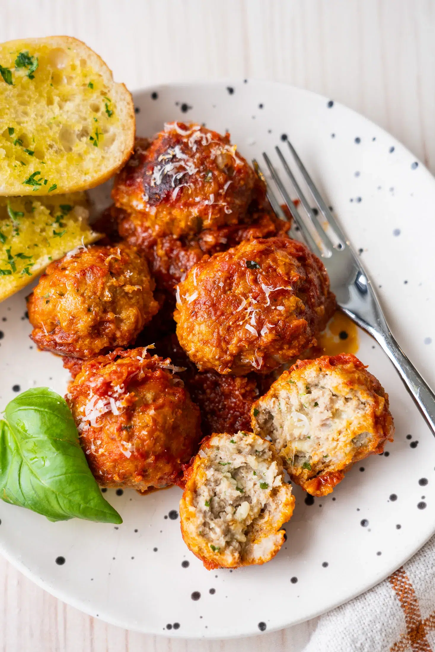 Closeup meatballs plated and cut open