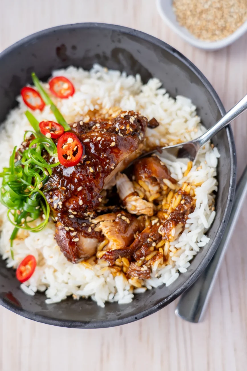 Tender braised soy chicken pulled apart