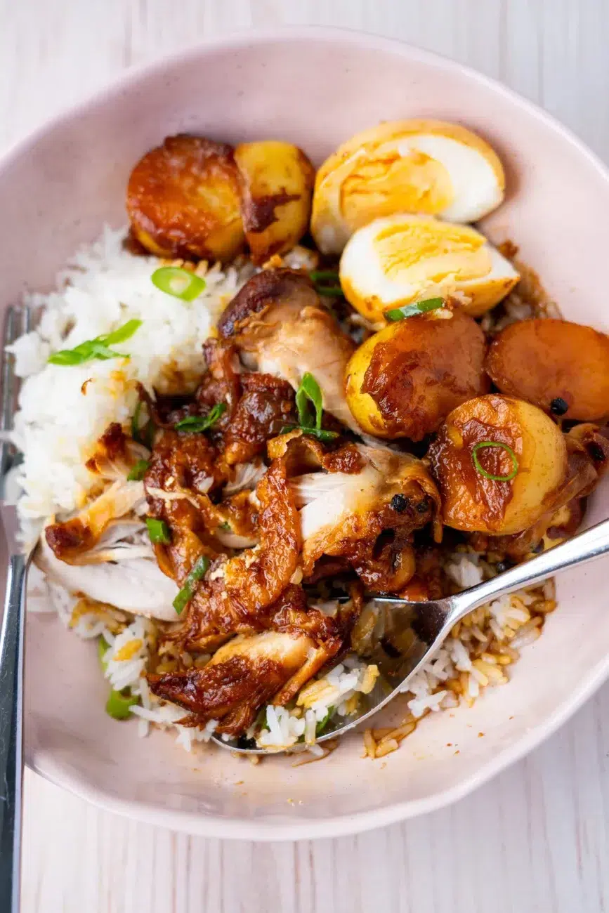 close up of chicken adobo with potatoes cut up